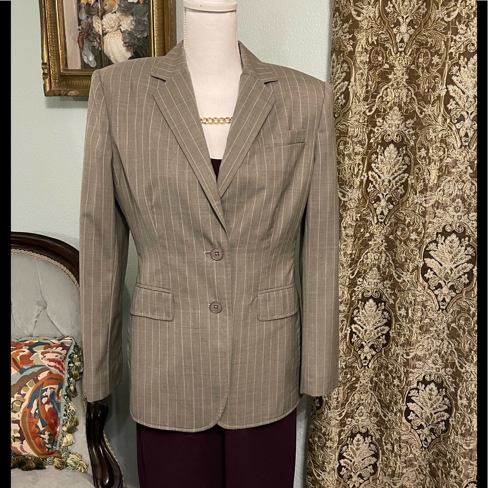 Gray and white pinstriped jacket.